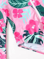 Traje de Baño  una pieza con estampado  tropical y floral con cremallera.