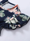 Mono con estampado floral de manga mariposa con cinturón